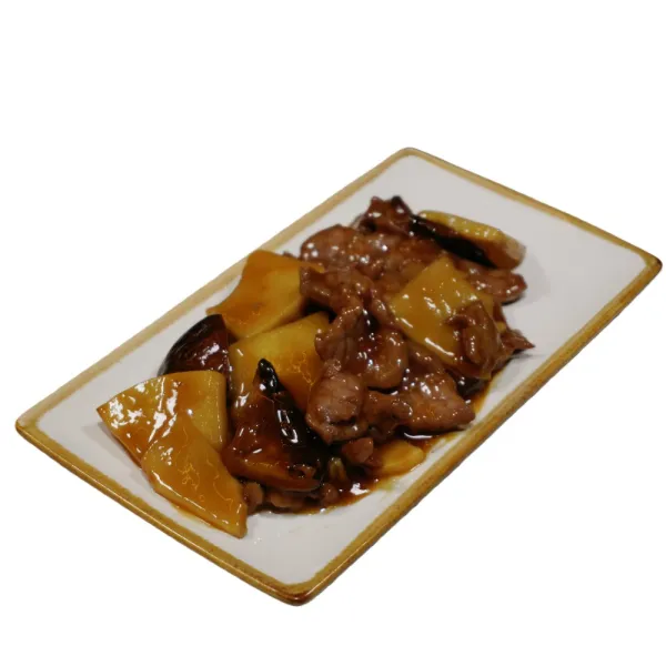 Ternera con bambú y setas