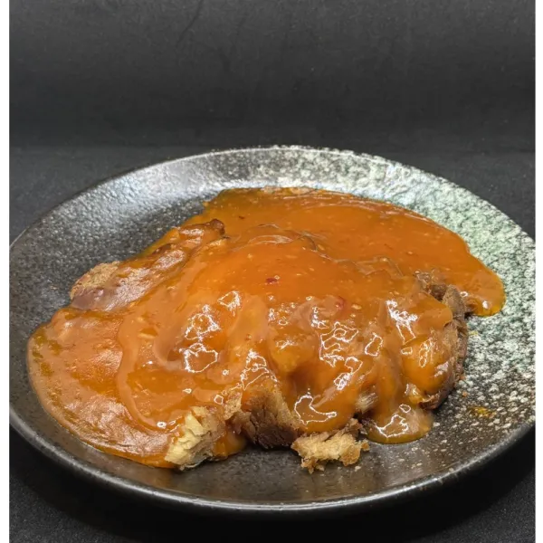 Cerdo asado con salsa picante