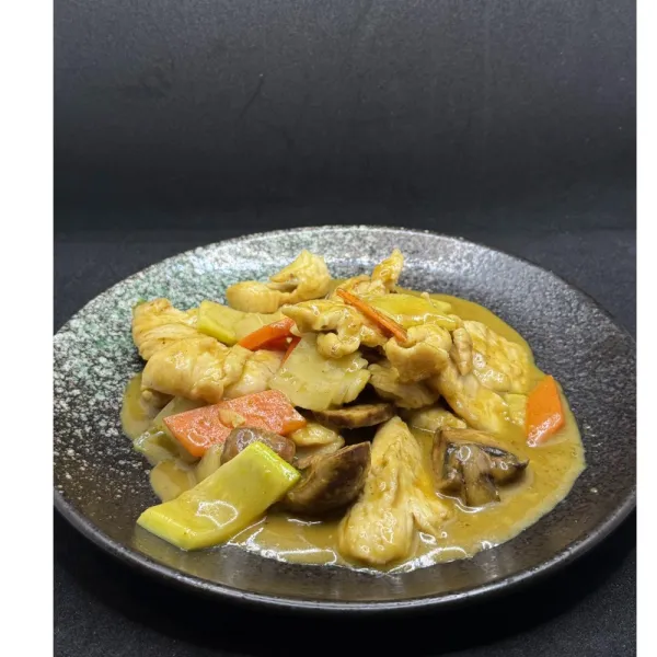 Pollo al curry tailandés